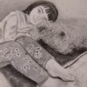 A young girl and her wire-haired Irish Terrier having a cuddle on the couch.