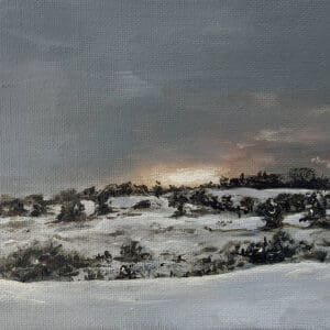 Hills in snow in sunrise